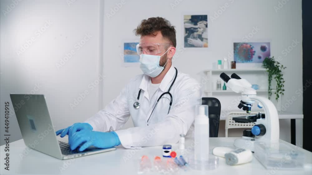 Doctor working on computer in his office Doctor working on computer in his office