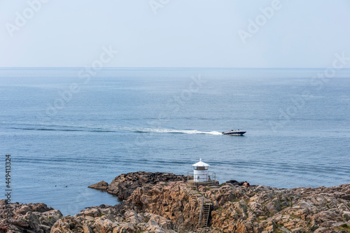 A small Lighthouse at Kullaberg coastline cape in Scania, Sweden