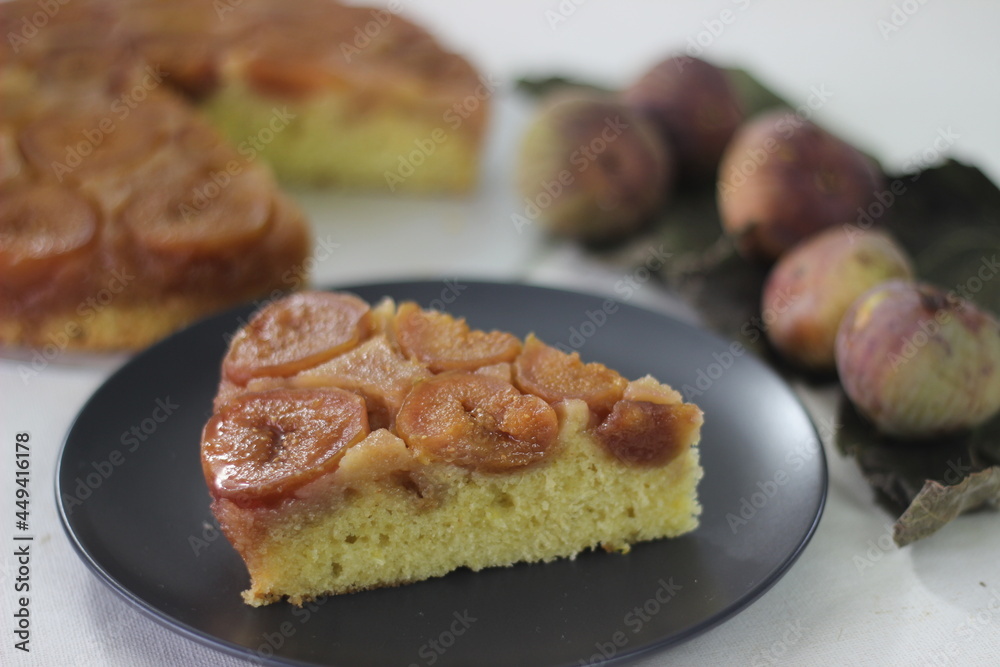 Slice of Fig upside down cake with lots of fresh figs and flavored with fresh orange juice.