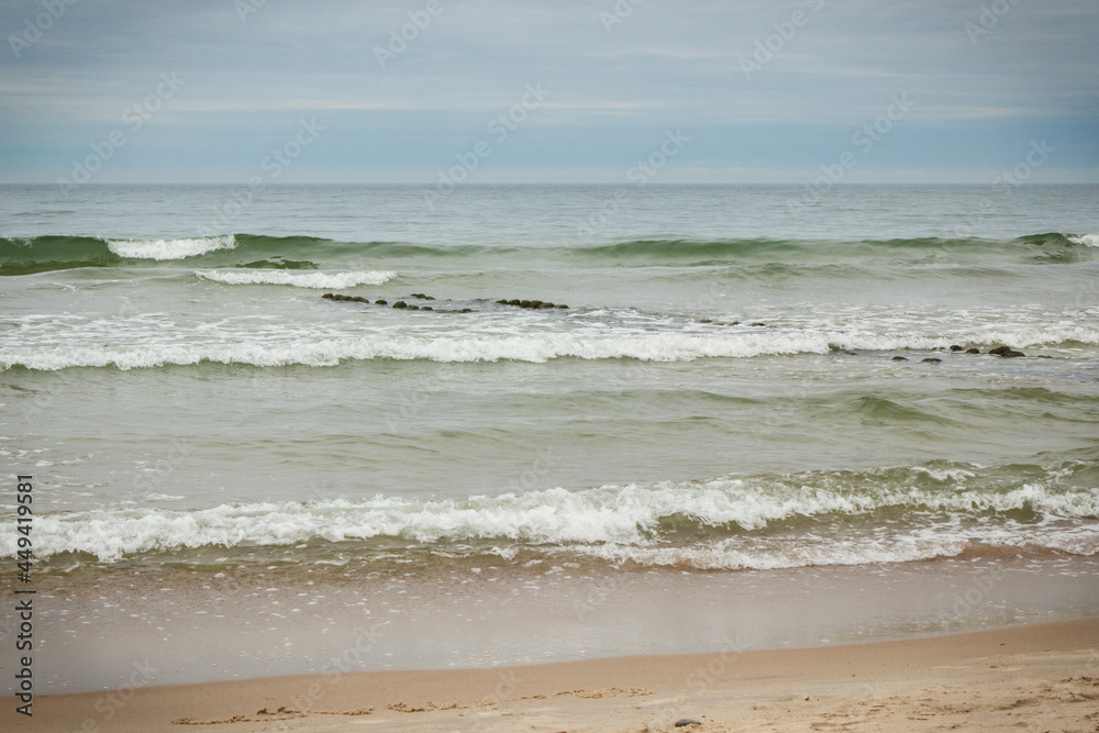 View on beach and sea with waves. Travel concept View on beach and sea with waves. Travel concept