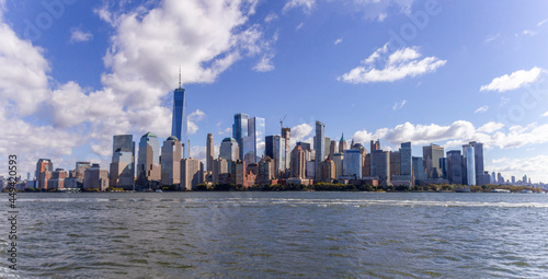 A picture of Manhattan skyline with Battery Park and Maritime terminals, bridges and Brooklyn, NY, USA