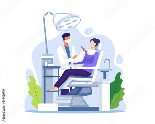 Dentist examining or treating patient teeth