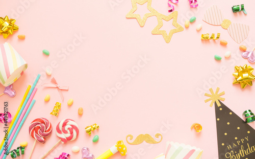 Accessories and decor for the holiday on a pink background