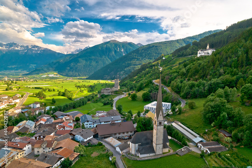 Alpine village of Burgeis and historic castles view photo