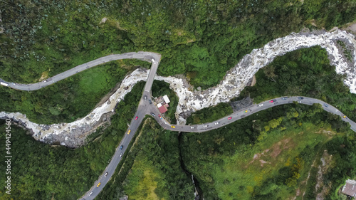 An aerial shot of intertwining roads and rivers in Quito, Ecuador