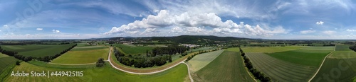 Panorama landscape from the air in the Bavarian Danube area with cloudy summer sky