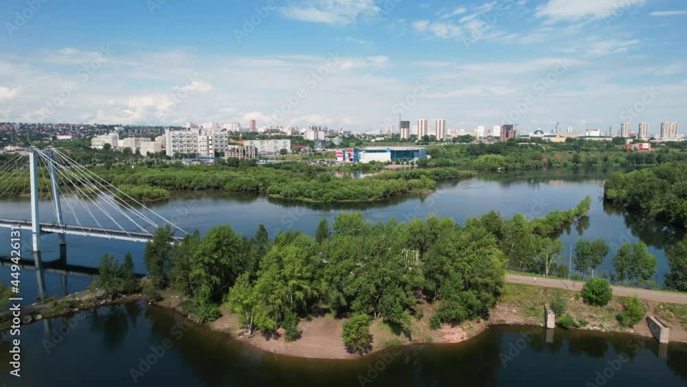 View of the city center, suspension bridge over the river, aerial video filmin View of the city center, suspension bridge over the river, aerial video filmin