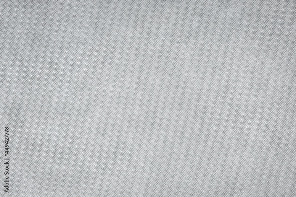 Fototapeta premium Gray textile background texture. Mesh seamless dot fabric