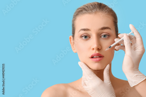 Young woman receiving fille...