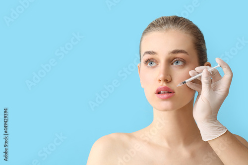 Young woman receiving fille...