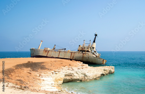 Abandoned ship Edro III near Cyprus beach. Rusty ship ran aground near the shore. High quality photo