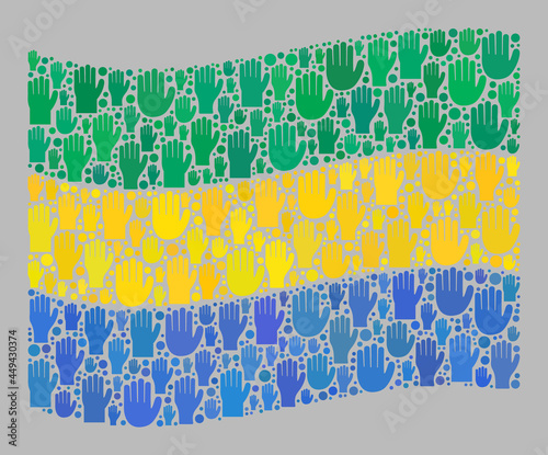 Mosaic waving Gabon flag constructed with upwards solution palm items. Vector voting mosaic waving Gabon flag designed for referendum purposes. Gabon flag collage is shaped with electoral hands. photo