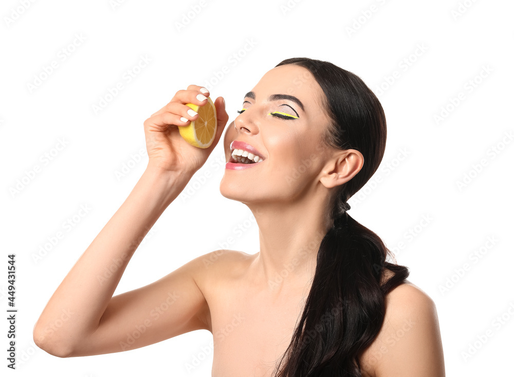 Beautiful young woman with lemon on white background Beautiful young woman with lemon on white background