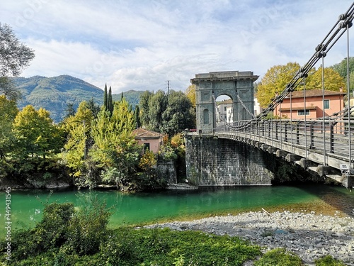 bridge over the river in the mountains photo