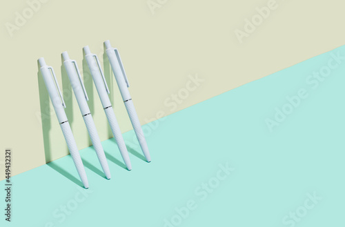 School and office supplies on isometric diagonal projection background. minimum set in ivory  blue  turquoise color  white ball pen. concept  back to school  minimalism. Copy space