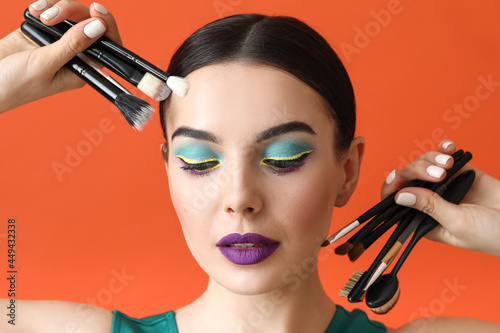 Beautiful young woman with ...