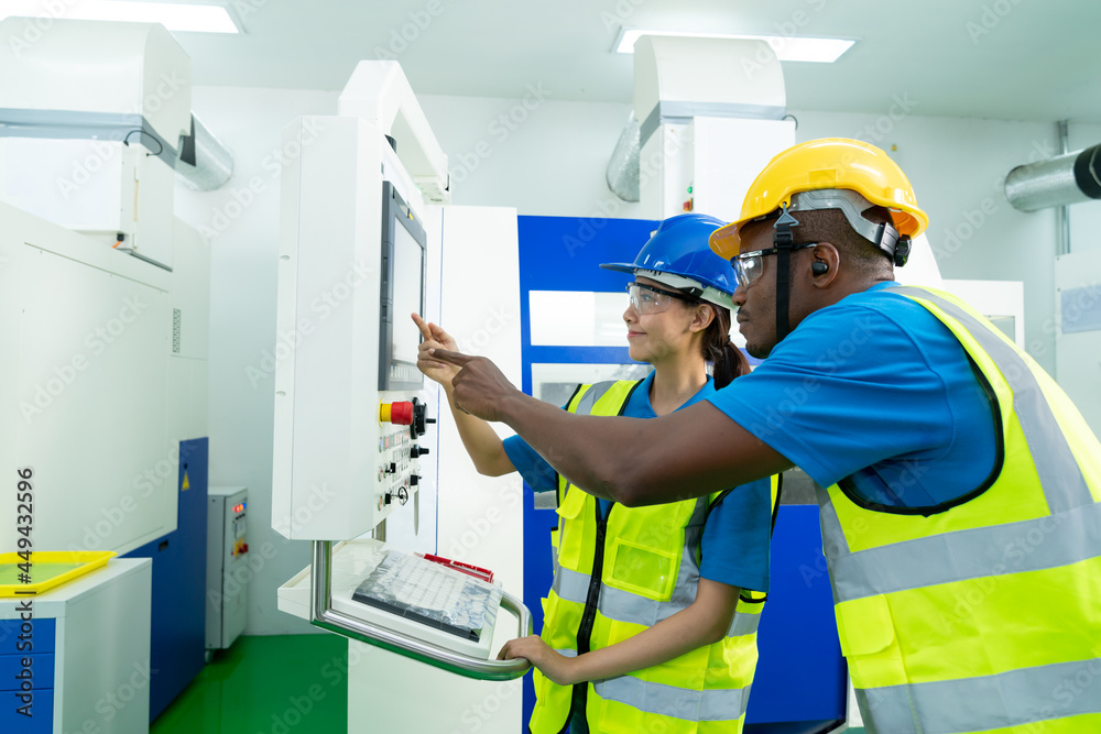 African technician engineer have to consult with colleagues African technician engineer have to consult with colleagues