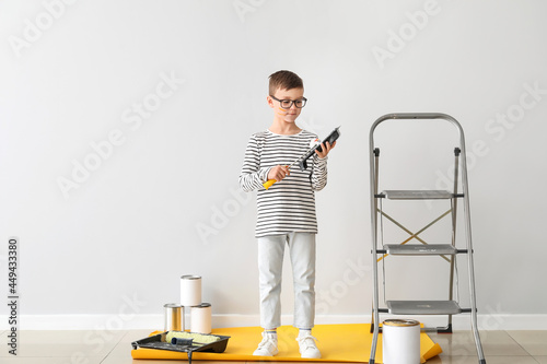 Cute little boy with paint ...