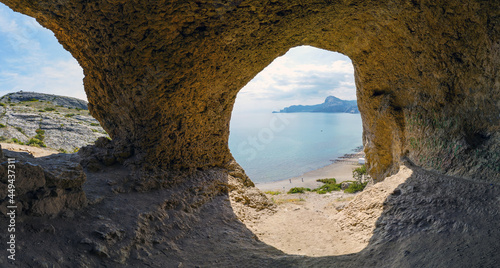 Sea view from a small cave on the slope of the coastal mountain Aeolian harp. Cape Alchak  Sudak  Crimea.