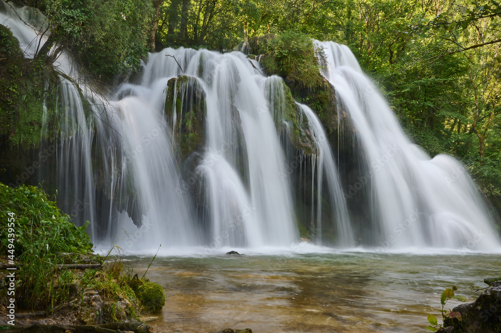 Waterfall Cascade des Tuffs in the Jura region of France. Waterfall Cascade des Tuffs in the Jura region of France.
