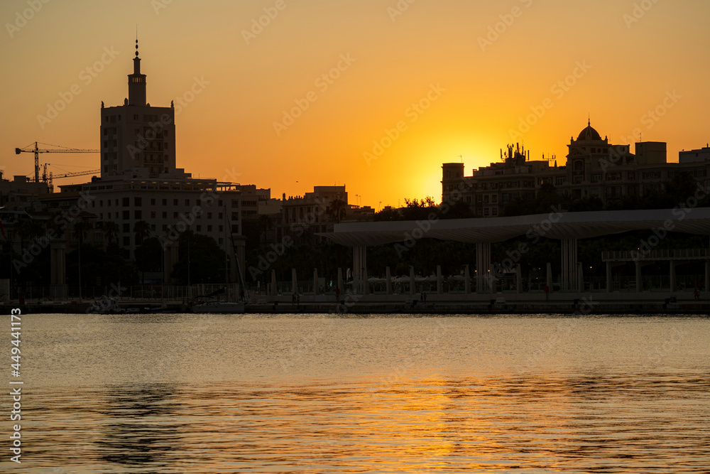 Fototapeta premium Views of Malaga city during sunset on a sunny summer day 