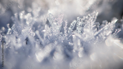 ice crystals closeup winter frost. The patterns made by the frost, hoarfrost background. macro photo, winter frosty background. cold season, winter season, low temperature. text © Oleksandr Filatov