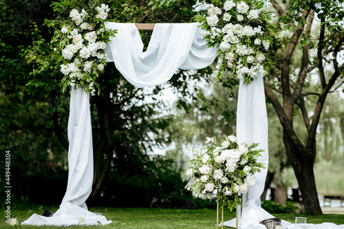 very beautiful wedding arch of the newlyweds in nature