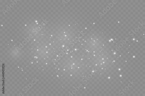 The dust sparks and golden stars shine with special light. Vector sparkles on a transparent background. . Vector illustration