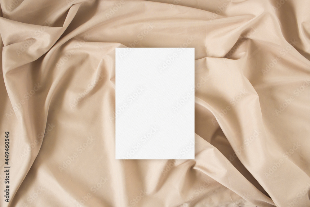 Mockup greeting card with on the nude fabric background Mockup greeting card with on the nude fabric background