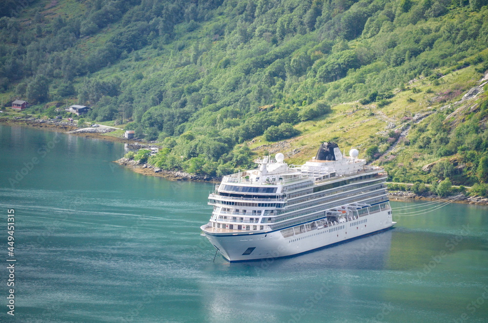 Cruise ship in Geiranger, Norway fjord Cruise ship in Geiranger, Norway fjord
