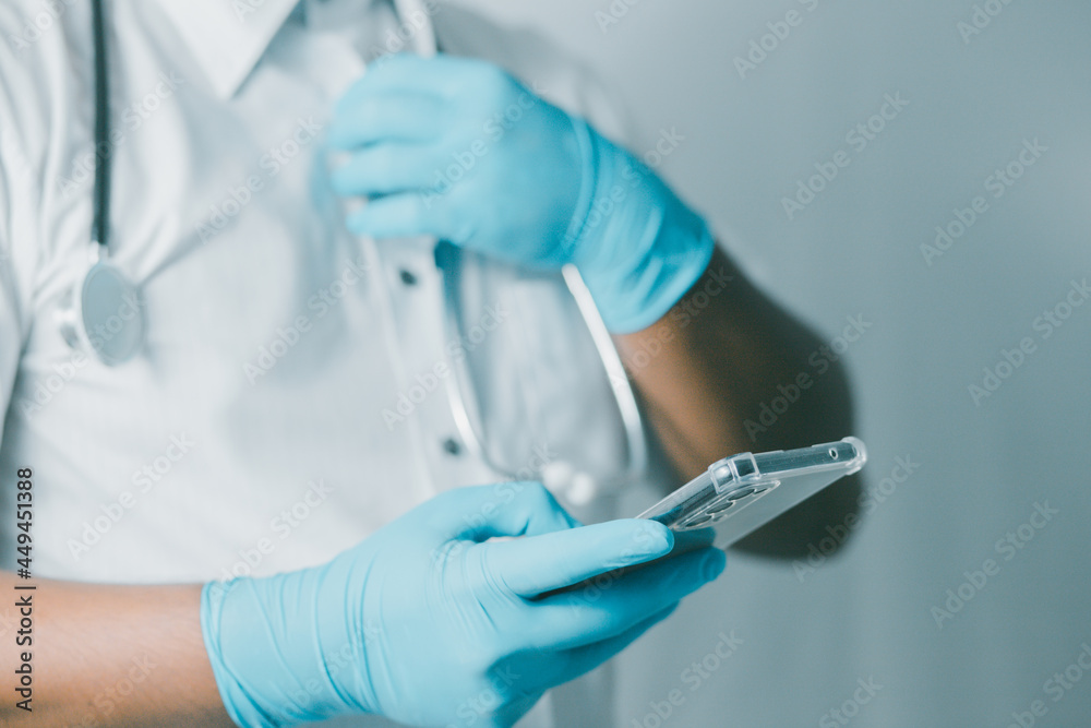 doctor or scientist uses a smartphone to study information about the mutant virus in the lab. Research concepts for COVID-19 virus disease
doctor or scientist uses a smartphone to study information about the mutant virus in the lab. Research concepts for COVID-19 virus disease