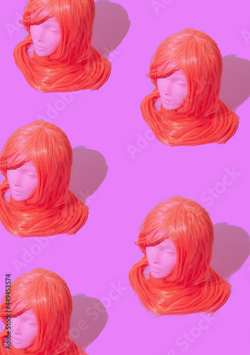 Dummy fashion girl with pink long wig hairs. Party shop, halloween, holiday concept. Minimalist isometric wallpaper