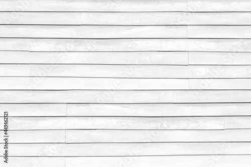 Old Wooden wall white color and vintage pattern in sun light for background and texture