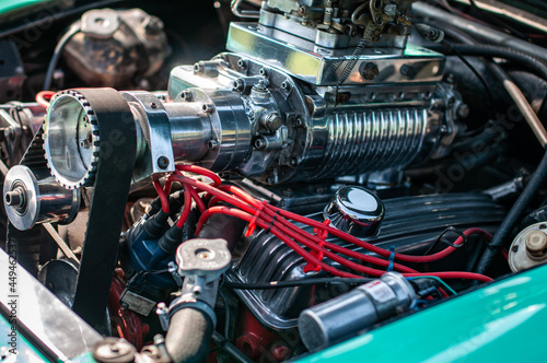 supercharged engine of a classic car photo