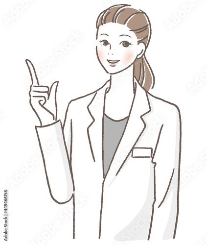 指をさす女性の医者