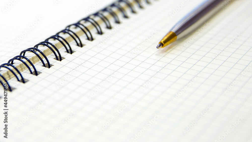 Close-up notebook or note book diary with a pen or pencil on top view desk or boardroom table for meeting notes. Close-up notebook or note book diary with a pen or pencil on top view desk or boardroom table for meeting notes.