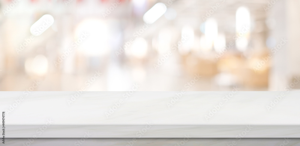 Empty white table top, counter, desk over blur perspective store with bokeh light background, White marble stone table, shelf and blurred shop for food, product display mockup, template Empty white table top, counter, desk over blur perspective store with bokeh light background, White marble stone table, shelf and blurred shop for food, product display mockup, template