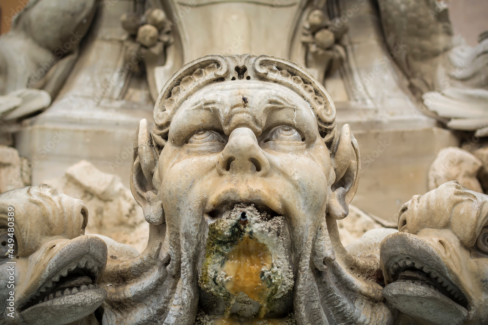 A statue of the Fontana del Pantheon in the Piazza della Rotonda, Rome, Italy A statue of the Fontana del Pantheon in the Piazza della Rotonda, Rome, Italy