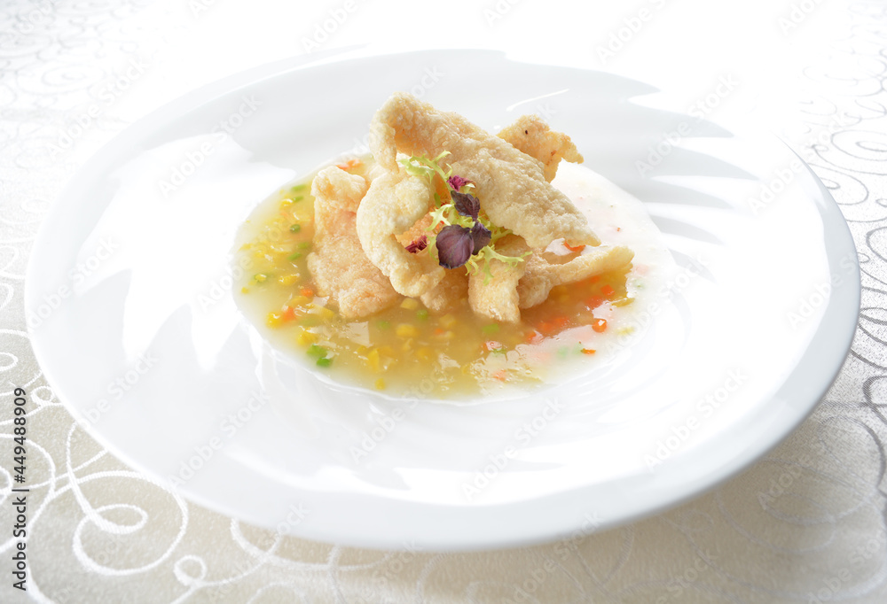 deep fried slices grouper fish fillet in golden corn yellow creamy sauce in white background asian halal seafood menu deep fried slices grouper fish fillet in golden corn yellow creamy sauce in white background asian halal seafood menu