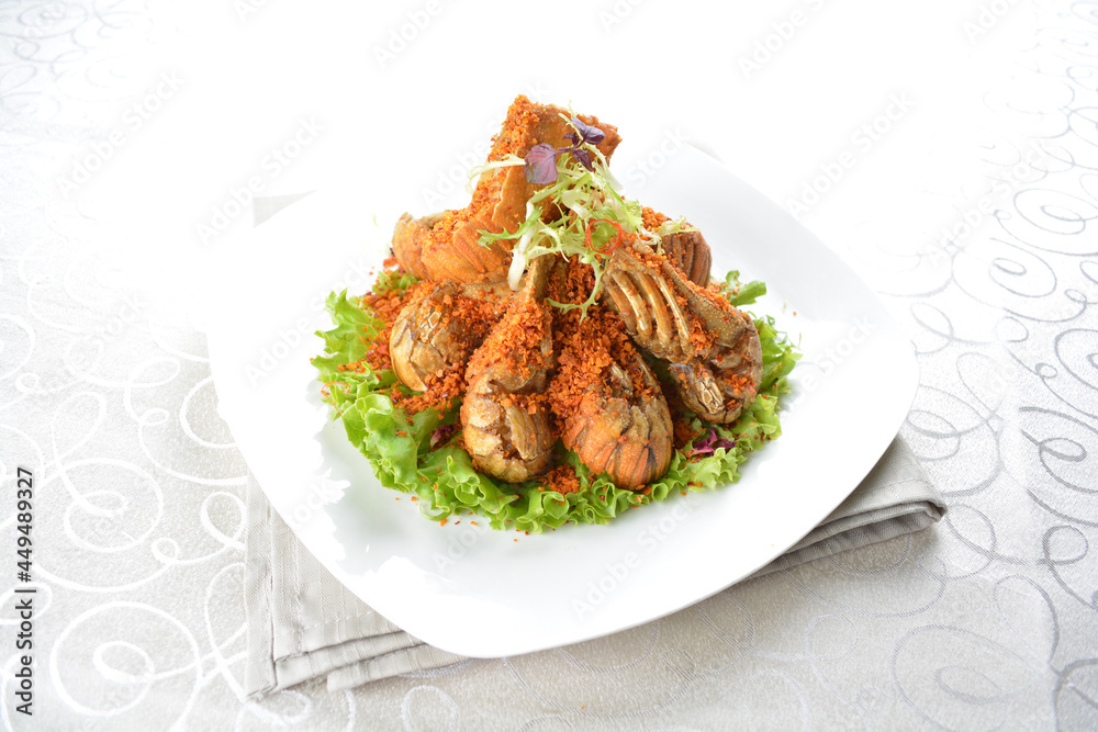stir fried crayfish prawn seafood with butter spicy cereal milk sauce taste in white background asian halal seafood menu stir fried crayfish prawn seafood with butter spicy cereal milk sauce taste in white background asian halal seafood menu