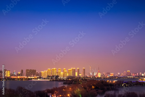 Beautiful city night view under colorful sky