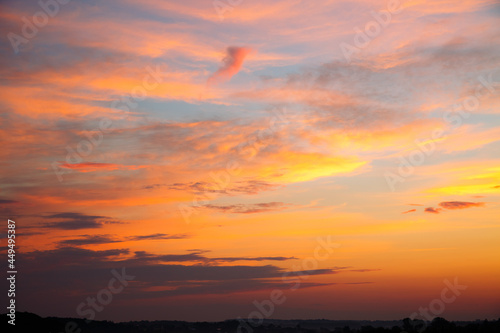 Incredible colorful sunset with cloudy sky. Photo of textured sky.
