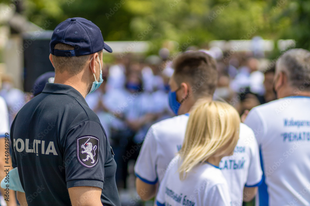A policeman at a protest A policeman at a protest