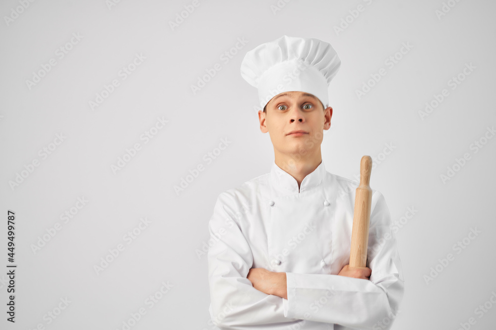 chef with a hat on his head kitchen utensils work in the kitchen