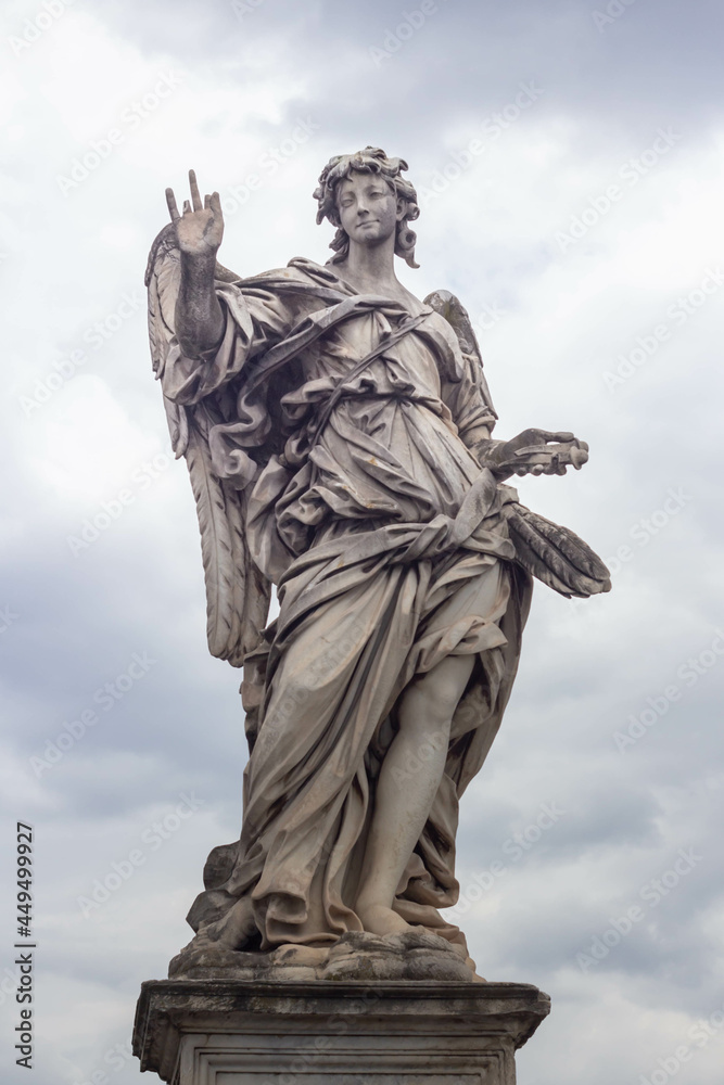 Fototapeta premium An Angel with the Nails on Ponte Sant'Angelo).One of the series of Angels with the Instruments of the Passion on the Ponte Sant'Angelo, Rome,Italy.