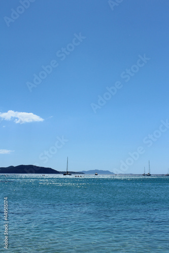 Beautiful blue sea coast with yachts  boats and the background of clear sky in June in La Ciotat in Provence-Cote-d Azur  a popular holiday destination for vacation travellers in France.