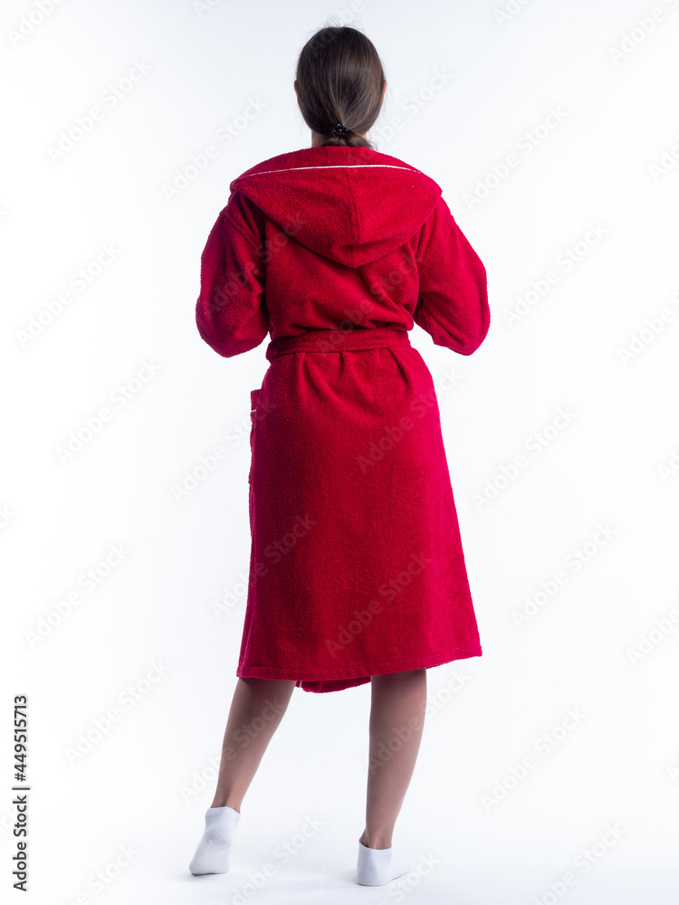 woman in a dressing gown from the back on an isolated white background. woman in a dressing gown from the back on an isolated white background.
