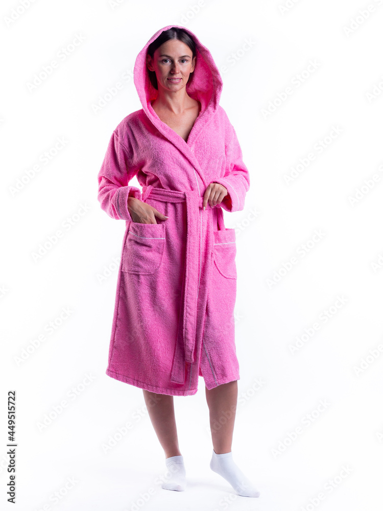 woman in a Bathrobe on an isolated white background with a smile on her face. woman in a Bathrobe on an isolated white background with a smile on her face.