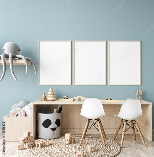 Picture frame mock up in nursery interior, wooden desk  on blue wall background, 3d render