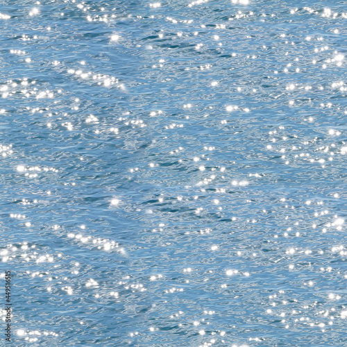 The sea sparkles in the sun. Seamless water background